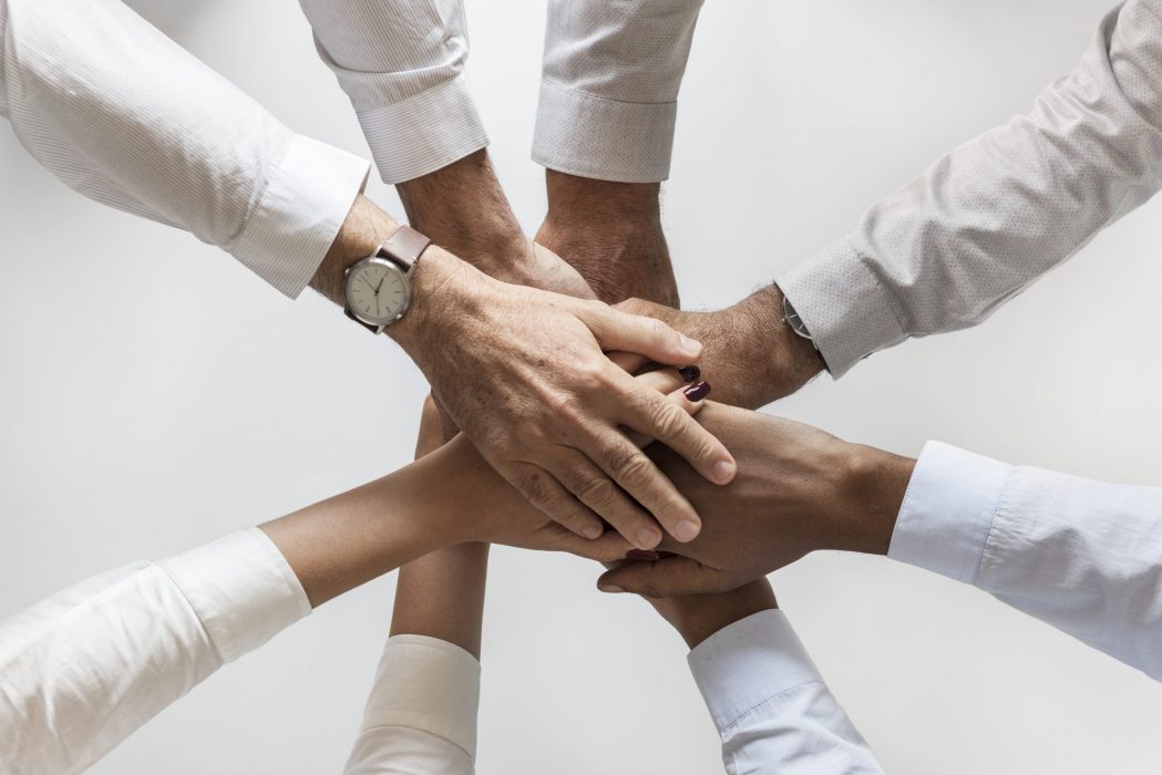 Business hands joined together teamwork Business hands joined together teamwork